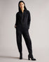 ALEYAH-Trousers-Get your wardrobe jumping for joy with the addition of ALEYAH. Bringing a statement for all seasons, this denim jumpsuit zips up at the front allowing for the ultimate cover-up or a slightly more revealing statement depending on your event. Pair with chunky boots for a more dressed up look, or match with simple trainers and a plain t-shirt for a casual day vibe. The fabric of this product contains organic cotton. Organic cotton has a proven lower environmental impact than conventional cotton